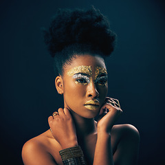 Image showing Gold, glitter and style with black woman and makeup in studio for luxury, cosmetics and African pride. Natural, creative and goddess with female model on background for queen, bronze and glamour