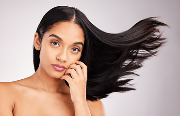 Image showing Hair flip, portrait and beauty of a woman in a isolated, white background and studio with salon treatment. Cosmetics, self care glow and young female model with healthy hairstyle texture and haircut