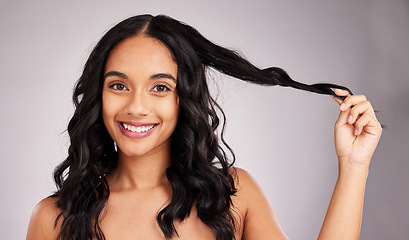 Image showing Hair, woman and beauty, happy in portrait with cosmetics and hairstyle on studio background. Wellness, shine and female smile, face and cosmetic care, keratin treatment and texture, volume and mockup