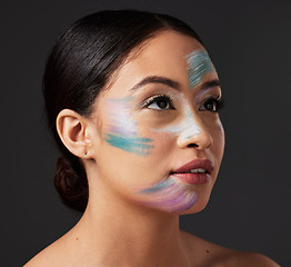 Image showing Beauty, art and portrait of woman paint on face, creative makeup and self expression. Skincare, creativity and color in artistic cosmetics, empowerment and freedom to express for young beautiful girl