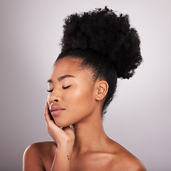 Image showing Skincare, beauty and black woman with eyes closed in confidence, white background and cosmetics product. Health, dermatology and natural makeup, African model in studio for healthy skin and wellness.