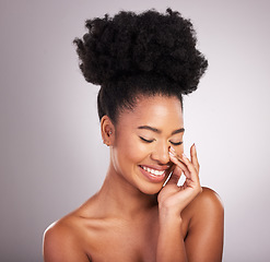 Image showing Skincare, beauty and smile, black woman with happiness, white background and cosmetics. Health, dermatology and natural makeup and African model in studio for healthy skin care and wellness