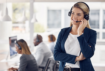 Image showing Woman, call center and smile in leadership with headset for telemarketing, customer service or support at office. Happy female consultant manager smiling with headphones for online advice or coaching