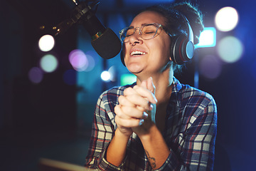 Image showing Radio DJ, headphones and microphone, woman is excited with singing or talking, broadcast media and announcement. Female in studio booth, recording and happiness with smile, excitement and carefree