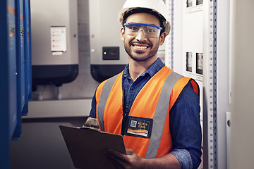 Image showing Portrait, happy man and engineering technician at control panel, inspection and planning maintenance on clipboard. Male electrician smile at electrical substation, power system and mechanic checklist