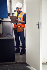 Image showing Man, technician and engineering with clipboard in control room, writing notes and machine maintenance. Male electrician, system and electrical substation for power, mechanic inspection and checklist