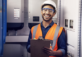 Image showing Portrait of happy man, engineering and technician at control panel, inspection and maintenance planning on clipboard. Male electrician smile at electrical substation for power, system and checklist