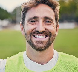 Image showing Rugby, field and portrait of man with smile, confidence and happiness in winning game. Fitness, sports and cropped face of happy player ready for match, workout or competition on grass at stadium.