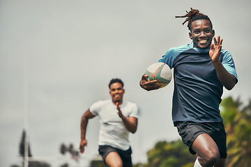 Image showing Rugby, energy and black man with ball running to score goal on field at game, match or practice workout. Sports, fitness and motion, player in action and blur on grass with action and skill in sport.