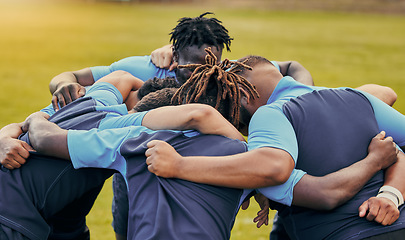 Image showing Diversity, team and men huddle in sports for support, motivation or goals outdoors. Man sport group and rugby scrum together for fitness, teamwork or success in collaboration before match or game