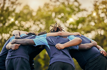 Image showing Team, men and huddle in sports for support, motivation or goals for coordination outdoors. Sport group and rugby scrum together for fitness, teamwork or success in collaboration before match or game