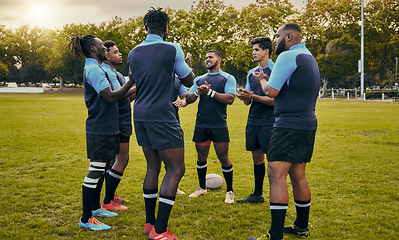 Image showing Diversity, team and men applause in sports for support, motivation or goals on grass field outdoors. Sport group clapping in fitness, teamwork or success for winning match or game victory