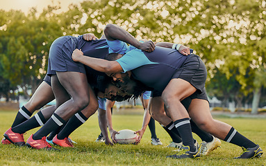 Image showing Scrum, sports and men playing rugby, catching a ball and preparing for a game on the field. Ready, together and competitive players scrumming for the start of a sport competition with contact