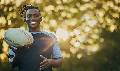 Image showing Rugby, ball and portrait of black man with smile, confidence and pride in winning game. Fitness, sports and happy face of player ready for match, workout or competition at stadium with mockup space.