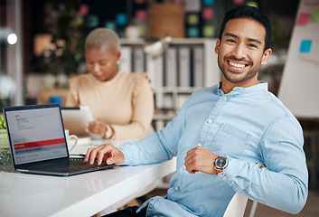 Image showing Portrait, smile and business man in office with pride for career, occupation or job. Ceo, night and happy, proud or confident Asian professional accountant sitting at table with laptop in company.