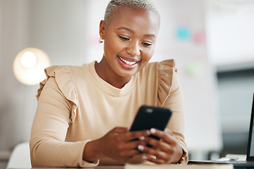 Image showing Black woman, office and texting for communication with phone, email or social media with happiness. Businesswoman, smartphone and chat for online dating, blog post and smile for contact at desktop