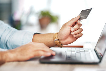 Image showing Man, hands and laptop with credit card for online shopping, ecommerce or wireless transaction on desk. Hand of male on computer for internet banking, app or financial purchase or payment on table