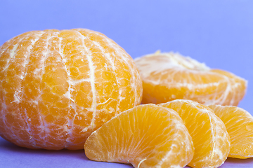 Image showing peeled delicious orange