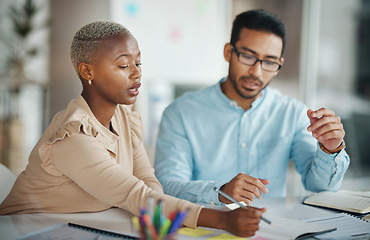 Image showing Teamwork, interracial and planning, brainstorming and meeting, market research and communication, strategy and discussion. Collaboration at digital marketing startup with people at desk writing notes