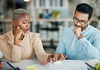 Image showing Team, interracial and planning, brainstorming and meeting, market research and communication, strategy and diversity. Collaboration at digital marketing agency, people talk at desk with sticky note