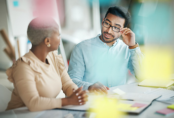 Image showing Team, interracial and brainstorming, talk in meeting for market research and overlay, strategy and sticky note. Collaboration at digital marketing startup, black woman and man at desk with teamwork