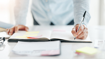 Image showing Closeup, hands and notebook for planning, writing and calendar for schedule, deadline and new project. Zoom, hand or male employee with pen, journal or notes for ideas, proposal and review for report