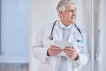 Image showing Thinking, man and doctor with tablet, healthcare or idea for solution, diagnosis or planning. Mature male, medical professional or worker with device, wonder or online research for wellness or window