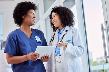 Image showing Tablet, healthcare or teamwork with a doctor and nurse talking in the hospital while doing research. Medical, collaboration and trust with professional colleagues in medicine working in a clinic