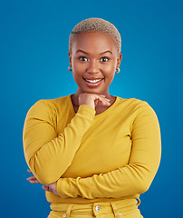 Image showing Happy, smile and portrait of black woman with confidence, happiness and empowerment in studio. Yellow fashion, beauty and girl model on blue background with pride, positive mindset and motivation