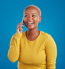 Image showing Phone call, connection and black woman talking in studio for social networking, contact and conversation. Communication mockup, smartphone and girl speaking, smile and chat online on blue background