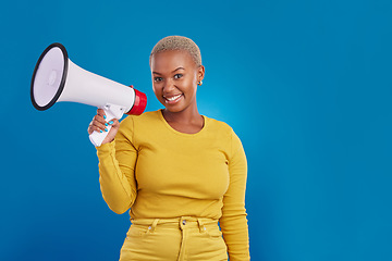 Image showing Black woman, megaphone and portrait, protest and voice, freedom of speech and activism on blue background. Female smile, broadcast and speak out, rally and mockup, loudspeaker with opinion in studio