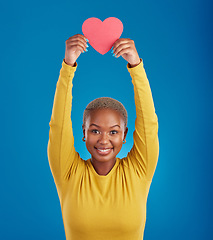 Image showing Paper, heart and portrait of black woman in studio for love, date and kindness. Invitation, romance and feelings with female and shape isolated on blue background for emotion, support or affectionate