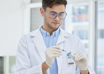 Image showing Doctor, man and vaccine, healthcare and needle syringe with bottle, medicine and safety from virus and research. Serious male in clinic, health insurance and medical professional to prevent disease