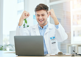 Image showing Success, medical and laptop with doctor in hospital and cheering for celebration, report or achievement. Winner, research and technology with man reading good news for healthcare, medicine or science