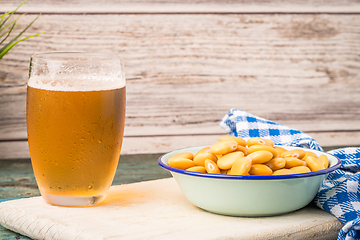 Image showing Tasty lupins and glass of beer