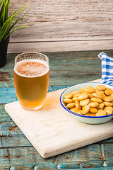 Image showing Tasty lupins and glass of beer