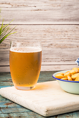 Image showing Tasty lupins and glass of beer