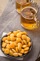 Image showing Tasty lupins and glass of beer