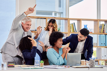 Image showing Business people, celebration and meeting in congratulations for promotion, sale or bonus at office desk. Group of employees celebrating corporate success, teamwork or support for winning achievement