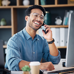 Image showing Business man, phone call and laughing at computer, office desk or conversation with smile. Happy worker, cellphone and communication for management, mobile networking or smartphone contact technology