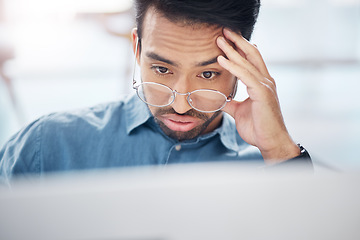 Image showing Asian man, frustrated and tired with laptop in office for glitch, problem or anxiety for proposal, idea or burnout. Businessman, computer and thinking with stress, depressed or headache for 404 error