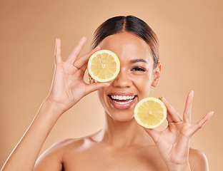 Image showing Skincare, lemon in hands and face of woman with smile for wellness, facial treatment and natural cosmetics. Beauty, spa and happy girl with fruit slice for citrus detox, vitamin c and dermatology