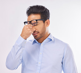 Image showing Headache, migraine and businessman stress pain, ill and sick or overworked isolated in a studio white background. Employee, sad and professional worker suffering from burnout and fatigue