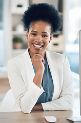 Image showing Happy, success and portrait of a black woman in the office with a computer working or doing research. Business, smile and African female corporate manager sitting at her desk with a pc in workplace.