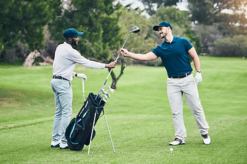 Image showing Golf, club and sports with men on course and playing for training, games and challenge. Tournament, help and support with golfer and caddy on lawn field for competition, hobby and leisure practice