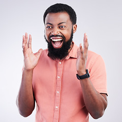 Image showing Screaming, surprise and cheering with black man in studio for shocked, announcement and crazy. Excited, winner and achievement with male isolated on white background for celebration, omg or good news