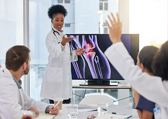 Image showing Medical presentation, woman and doctors xray with hospital team with question. Orthopedic research, happy and collaboration workshop of a health and healthcare group in clinic for diagnosis strategy