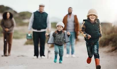 Image showing Running, excited and family at the beach for fishing, hobby and weekend activity. Carefree, freedom and children, parents and grandparents playing by the ocean and ready to catch fish for recreation