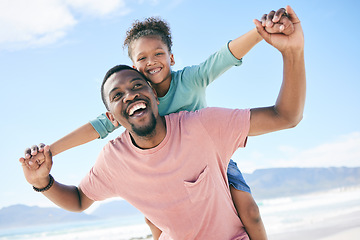 Image showing Beach, black man with child on piggy back and smile on playful family holiday in Australia with freedom and fun. Travel, happy father and girl playing, flying and bonding together on ocean vacation.