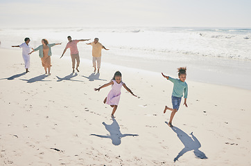 Image showing Family have fun on beach, freedom and travel, generations and happy people outdoor, grandparents with parents and kids. Adventure, carefree and excited, running and playful with happiness on vacation